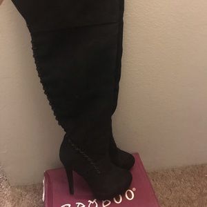 Over the knee black boots
